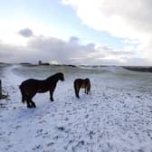 Snow on the hills earlier on this morning.