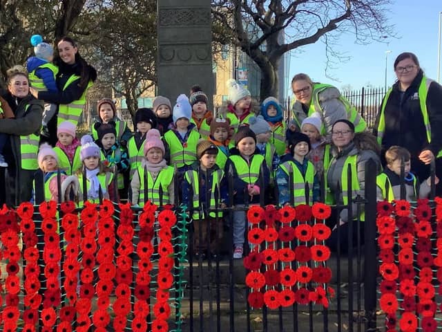 Youngsters from Nurserytime at South Shields war memorial.