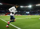 PARIS, FRANCE - MARCH 11: (FREE FOR EDITORIAL USE) In this handout image provided by UEFA, Edinson Cavani of Paris Saint-Germain runs out to warm up prior to the UEFA Champions League round of 16 second leg match between Paris Saint-Germain and Borussia Dortmund at Parc des Princes on March 11, 2020 in Paris, France. The match is played behind closed doors as a precaution against the spread of COVID-19 (Coronavirus).  (Photo by UEFA - Handout/UEFA via Getty Images)