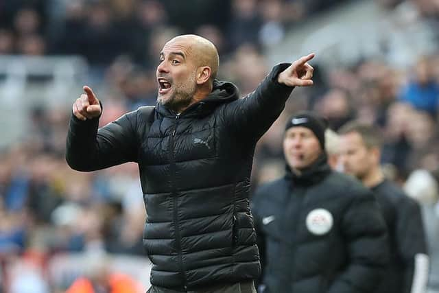 Manchester City manager Pep Guardiola is anticipating a tough game at St James's Park on Sunday (Photo by Ian MacNicol/Getty Images)