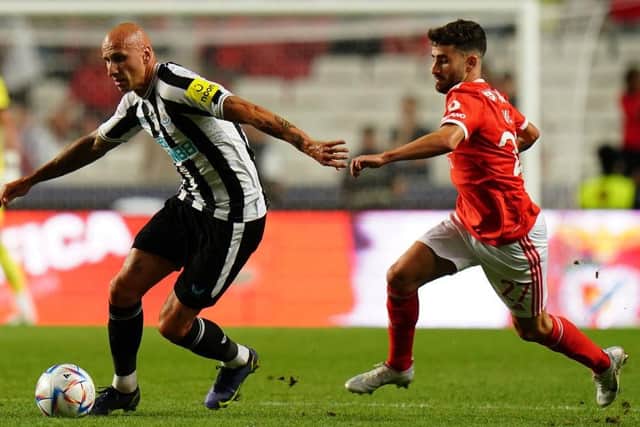 Jonjo Shelvey of Newcastle United FC with Rafa Silva of SL Benfica in action during the Eusebio Cup match between SL Benfica and Newcastle United at Estadio da Luz on July 26, 2022 in Lisbon, Portugal.  (Photo by Gualter Fatia/Getty Images)