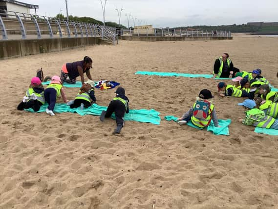 The beach yoga session.