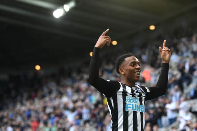 Newcastle player Joe Willock celebrates after scoring the winning goal during the Premier League match between Newcastle United and Sheffield United at St. James Park on May 19, 2021 in Newcastle upon Tyne, England. (Photo by Stu Forster/Getty Images)