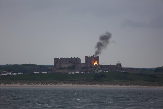This image of the castle on fire was taken by Rowan Harris-Jones from the Farne Islands.