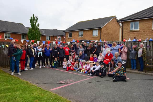 Residents enjoy the Jubilee street party in Orchid Gardens