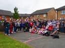 Residents enjoy the Jubilee street party in Orchid Gardens