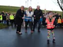 South Tyneside Council Leader Cllr Tracey Dixon and South Shields Football Club's Geoff Thompson, with North Marine Park Junior Park Run director Sally Foreman, and her daughter Abigail.