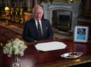 King Charles III delivers his address to the nation and the Commonwealth from Buckingham Palace. Picture PA/PA Images.
