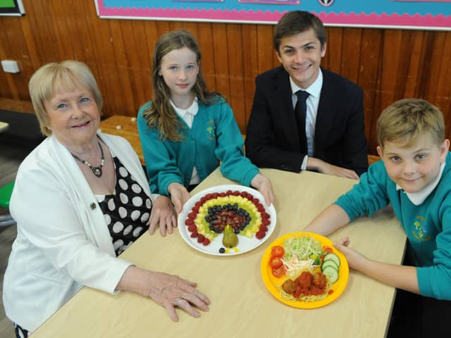 Leon Hardie and Ruby Dougherty, pupils at Bedeburn Primary School in Jarrow, with Councillors Margaret Meling and Adam Ellison.