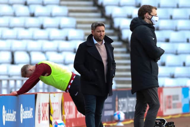 Lee Johnson watches on as his side draw 3-3 with Accrington Stanley