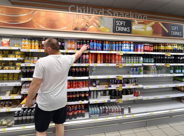 <p>Tesco shoppers could get stung by a 50p price hike on a meal deal, unless they have a Clubcard. (Photo by JUSTIN TALLIS / AFP) (Photo by JUSTIN TALLIS/AFP via Getty Images)</p>