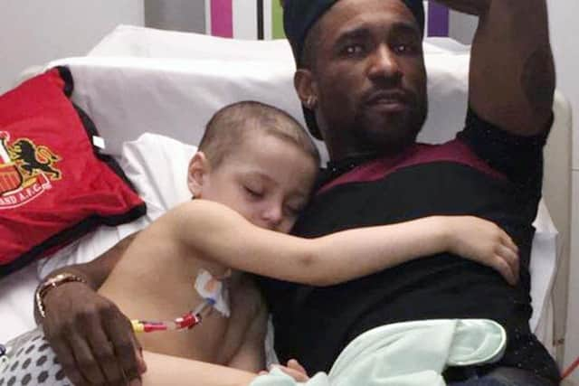 Bradley Lowery with Jermain Defoe