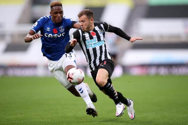 Everton's Colombian defender Yerry Mina (L) vies with Newcastle United's Scottish midfielder Ryan Fraser (R) during the English Premier League football match between Newcastle United and Everton at St James' Park in Newcastle-upon-Tyne, north east England on November 1, 2020.