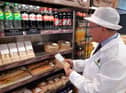 Environmental Health Officer David Jarvis checks allergen information and signage at MI Dicksons.