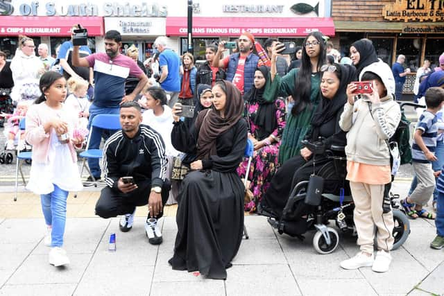 Members of the Bangladeshi community enjoy the Independance story telling.