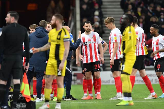 Players leaving the pitch after play was stopped at the Stadium of Light to provide medical treatment to supporter Michael Waggott, who the club have announced has now sadly passed away.