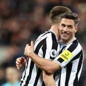 Sean Longstaff and Fabian Schaer of Newcastle United celebrate following the Premier League match between Newcastle United and Wolverhampton Wanderers at St. James Park on March 12, 2023 in Newcastle upon Tyne, England. (Photo by Naomi Baker/Getty Images)