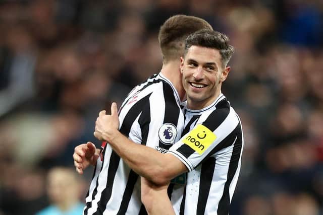 Sean Longstaff and Fabian Schaer of Newcastle United celebrate following the Premier League match between Newcastle United and Wolverhampton Wanderers at St. James Park on March 12, 2023 in Newcastle upon Tyne, England. (Photo by Naomi Baker/Getty Images)