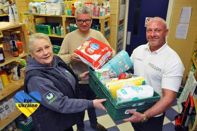 Jo Durkin ,from Hebburn Helps, with Paul Briggs and David Thompson, loading crates of items to take on their mercy-mission to help refugees fleeing war-torn Ukraine. 

Photograph: Frank Reid