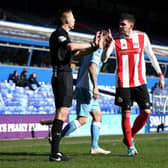 Kyle Lafferty complains to the officials after Max Power's goal was ruled out.