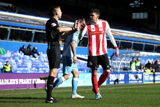 Kyle Lafferty complains to the officials after Max Power's goal was ruled out.