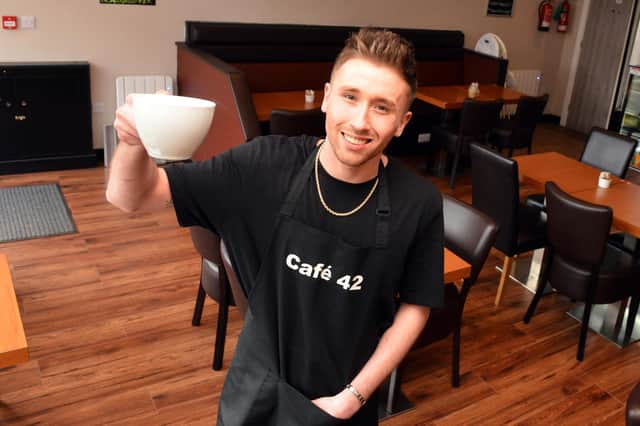 Musician Sam Clarke pictured in Cafe 42 before the lockdown.