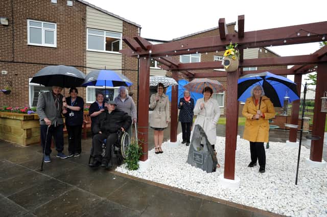 South Tyneside Council leader Cllr Tracey Dixon, deputy leader Cllr Joan Atkinson, Cllr Anne Hetherington, and Vicki Pattison, at Clare Blake's memorial garden, Clasper Court, South Shields.