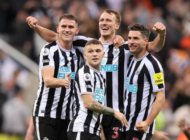 Dan Burn, back centre, with Newcastle United team-mates, left to right, Sven Botman, Kieran Trippier and Fabian Schar in October.
