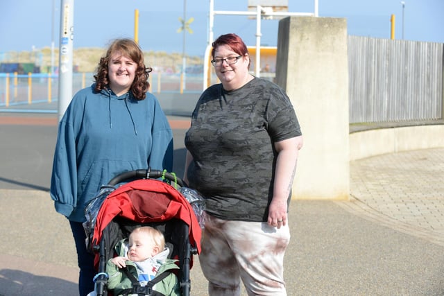 Out and about at Sandhaven Beach. From left, Fiona Hamilton and Lizzie Robinson with Jonah, one.