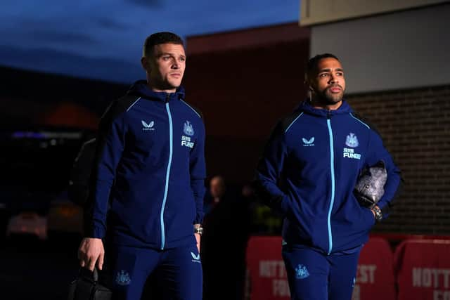 Newcastle United's Callum Wilson, right, and Kieran Trippier arrive at the City Ground.