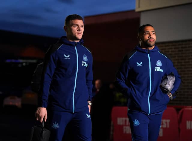 Newcastle United's Callum Wilson, right, and Kieran Trippier arrive at the City Ground.