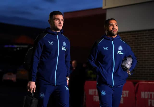 Newcastle United's Callum Wilson, right, and Kieran Trippier arrive at the City Ground.