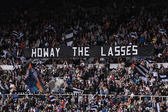 A banner welcomes Newcastle United Women on to the pitch.