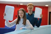 Jarrow School student Jessica Stonehouse and Dwight Davies with their GCSE results.