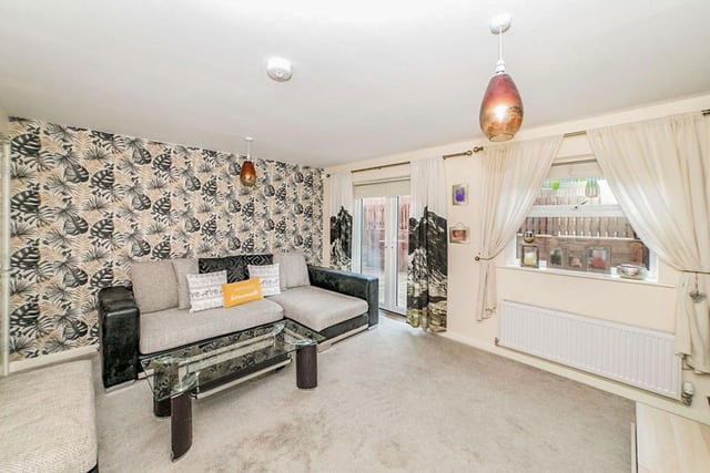 The big, yet cosy lounge has double doors, which lead to the garden.

Photo: Rightmove/Duncan McCall