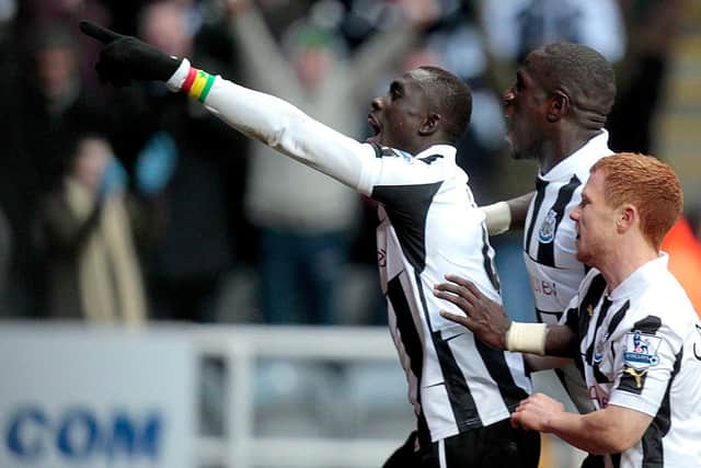 Newcastle United's Senegalese striker Papiss Cisse (L) celebrates scoring the winning second goal with French midfielder Moussa Sissoko (2L) and Adam Campbell (R) during the English Premier League football match between Newcastle United and Stoke City at St James' Park in Newcastle Upon Tyne, northeast England, on March 10, 2013.  Newcastle sealed a 2-1 victory against Stoke with a late goal from Cisse.