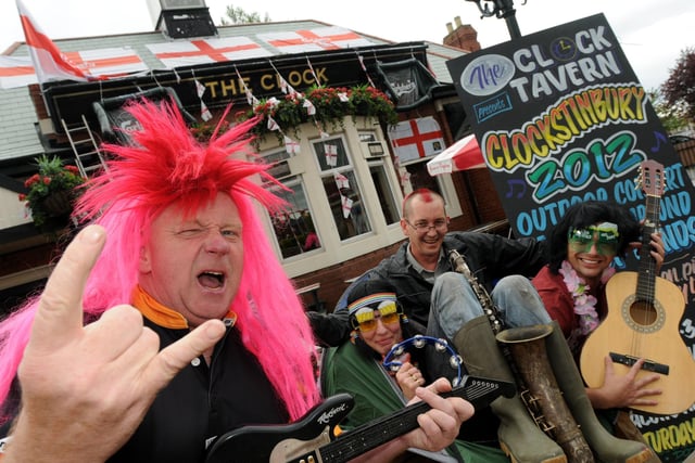 Landlord Norman Scott with Emma Brown, Sean Mason and Chris Lloyd as they got ready for Clockstinbury in 2012.