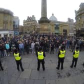 Police form a barrier between rival protesters in Newcastle city centre. Photo credit: North News and Pictures