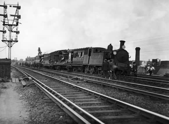 A derailed Southern Railway train at Raynes Park station in London, 25th May 1933. (Photo by J. A. Hampton/Topical Press Agency/Hulton Archive/Getty Images)