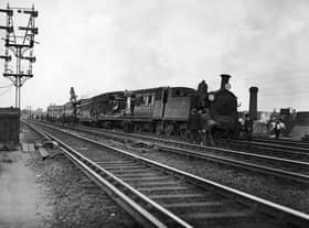 A derailed Southern Railway train at Raynes Park station in London, 25th May 1933. (Photo by J. A. Hampton/Topical Press Agency/Hulton Archive/Getty Images)