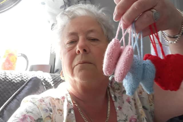 South Shields resident Jackie Mountain with her knitted hearts for patients.