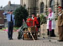 A bouquet of poppies were placed on the drum altar during the service.