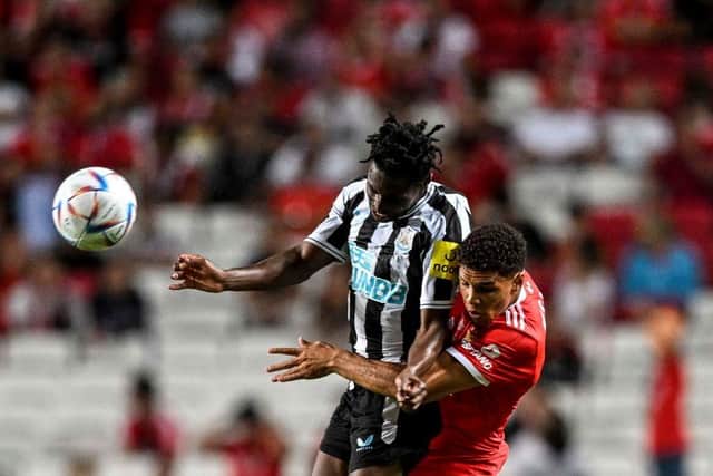 Benfica's Danish defender Alexander Bah (R) fights for the ball with Newcastle's English midfielder Matthew Bondswell (L) during the "Eusebio Cup" friendly football match between Benfica and Newcastle at the Luz stadium in Lisbon on July 26, 2022. (Photo by PATRICIA DE MELO MOREIRA/AFP via Getty Images)