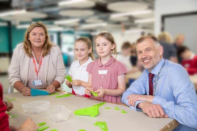 Primary STEM Day students with North East STEM Foundation Chair, Tania Cooper MBE, and Tom Dower, UTC South Durham principal and trustee at the North East STEM Foundation.