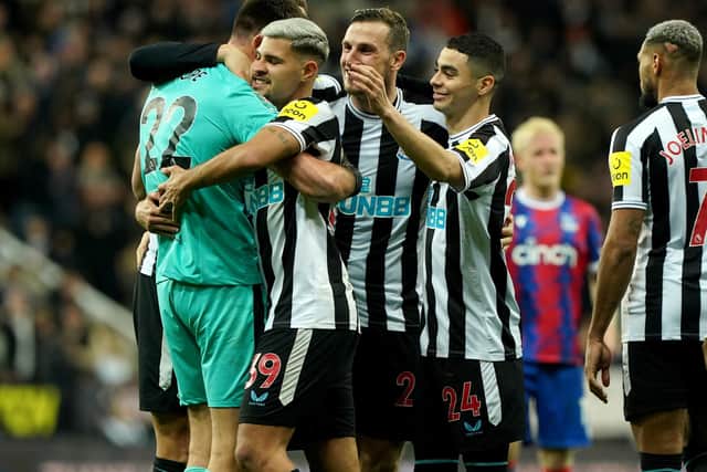 Newcastle United's players celebrate the club's win over Crystal Palace.