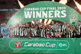 Newcastle United's Bruno Guimaraes and Kieran Trippier lift the Carabao Cup trophy with team-mates following victory at Wembley Stadium over Liverpool. (Photo by Owen Humphreys/PA Wire)
