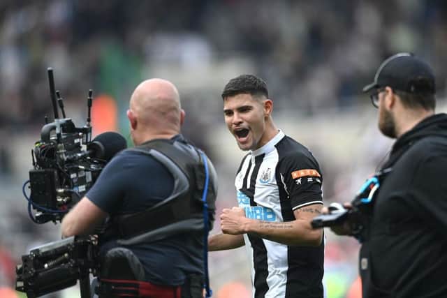 Newcastle player Bruno Guimaraes celebrates to the Mobile Television camera after scoring the winning goal during the Premier League match between Newcastle United and Leicester City at St. James Park on April 17, 2022 in Newcastle upon Tyne, England. (Photo by Stu Forster/Getty Images)