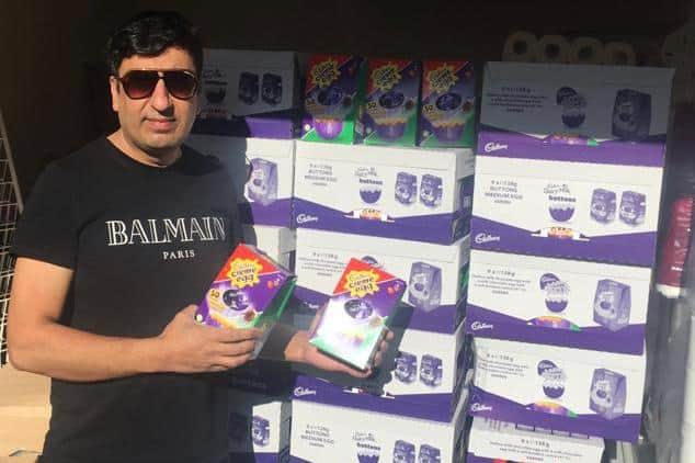Jarrow shopkeeper Nico Ali with some of the Easter eggs his shop has given to local children.