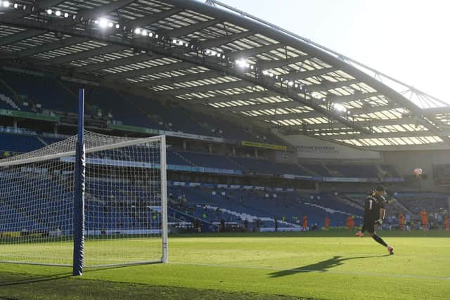 Martin Dubravka of Newcastle United takes a goal-kick during the Premier League match between Brighton & Hove Albion and Newcastle United at American Express Community Stadium on July 20, 2020 in Brighton, England.