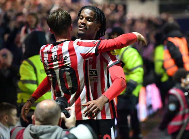 Jack Clarke celebrates with Pierre Ekwah